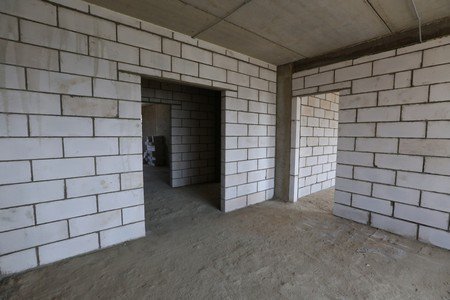 По какой цене производится монтаж стен из пеноблоков?